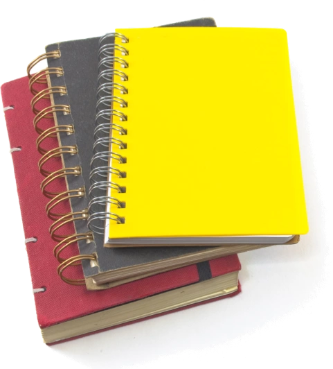 Image of three notebooks stacked on top of eachother